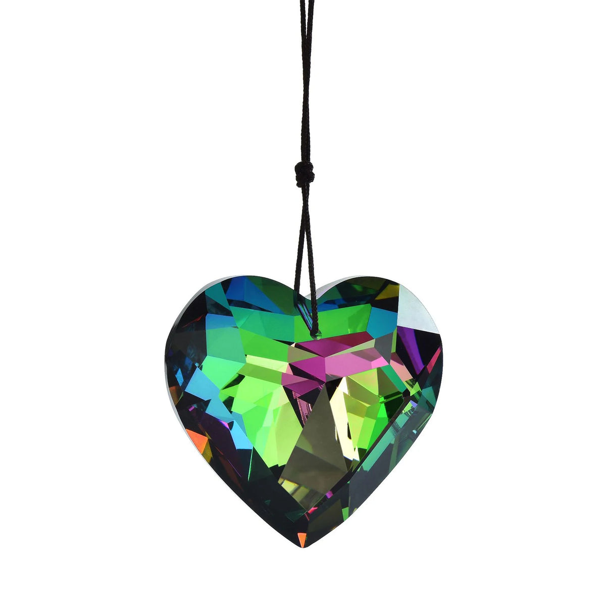 A heart-shaped window pendant made of iridescent, multicolored glass.