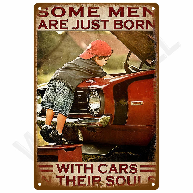 A vintage retro metal wall sign featuring a photo of a boy leaning on a red car with the text Some men are just born with car