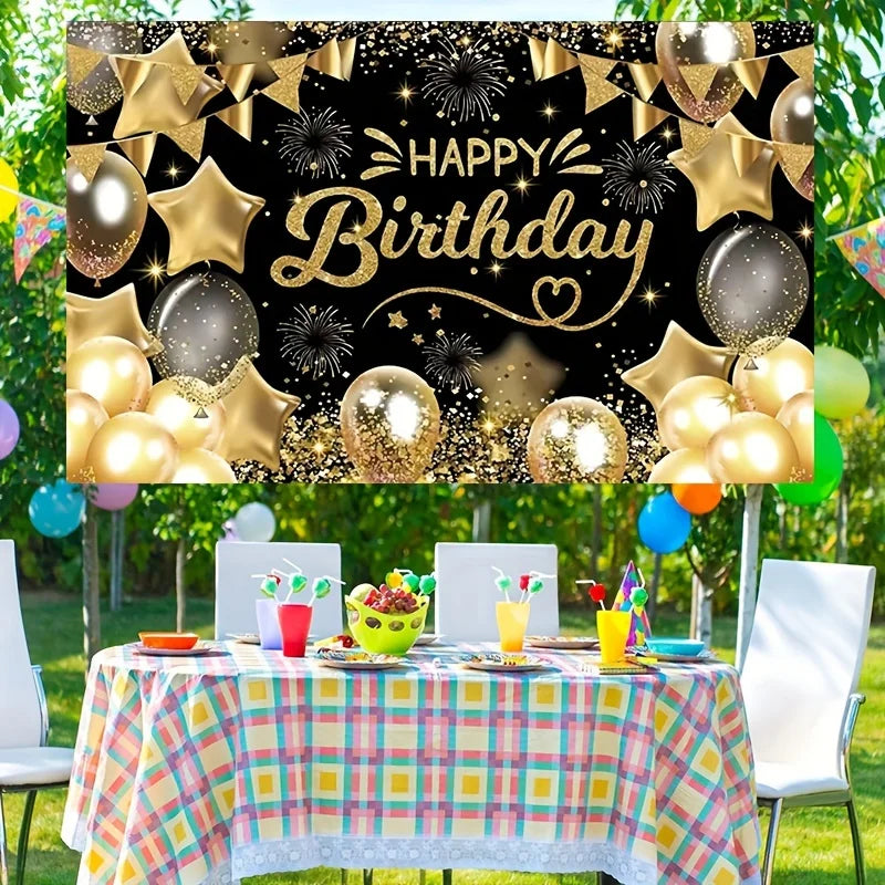 A black and gold birthday party backdrop featuring stars, confetti, and balloons on a table setup.