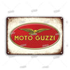 Vintage metal sign with a red oval featuring a golden winged motorcycle logo and the text MOTO GUZZI
