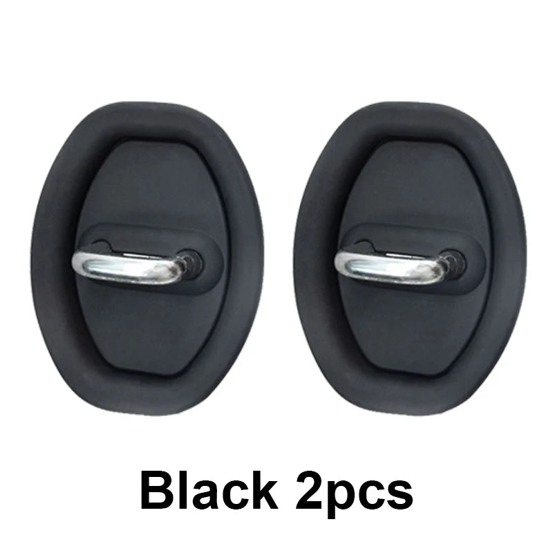Two black silicone car door lock protectors with silver metal pins.