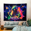 A dark tapestry featuring a vibrant, psychedelic alien design with neon purple and pink colors against a starry background.