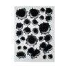 A collection of black, irregular bullet hole shaped stickers on a white background.