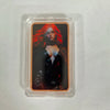 A fine copper fantasy art bar in a protective case featuring a portrait of a woman with red hair.