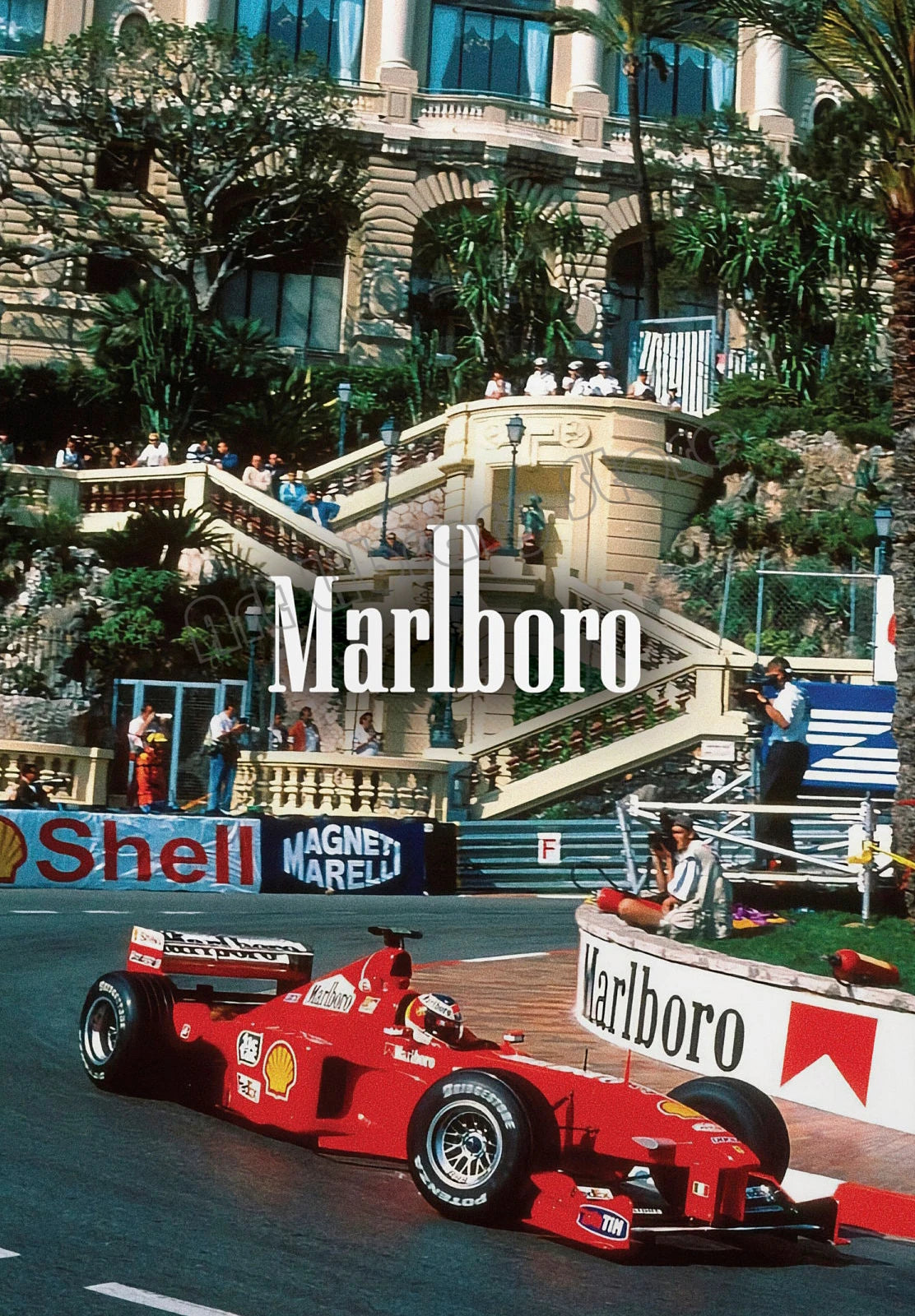A red and white Marlboro Formula 1 race car is shown on a track with a grand building in the background.