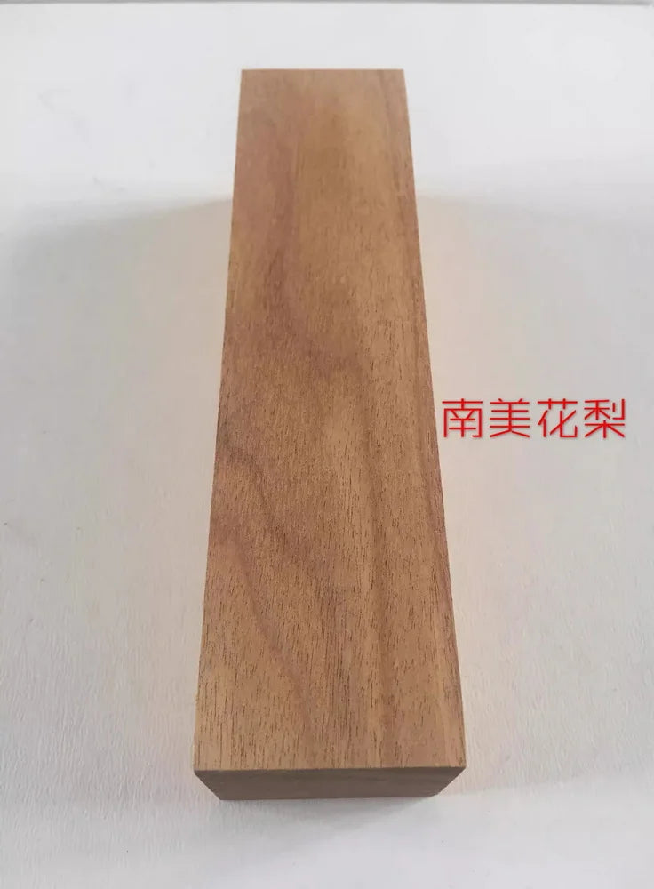 A rectangular block of natural wood, likely a blank for knife handles or DIY projects.