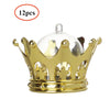 A set of twelve gold-colored crown-shaped candy boxes with clear domes.
