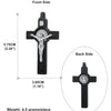 A black wooden crucifix pendant with a figure of Jesus Christ on the front and a circular medallion on the back.
