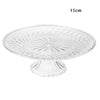 Clear acrylic serving plate with a decorative pattern and pedestal base, measuring 15cm.