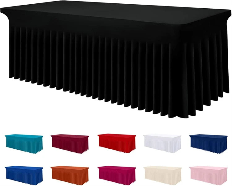 A collection of rectangular stretch tablecloths in various colors including blue, red, white, and pink.