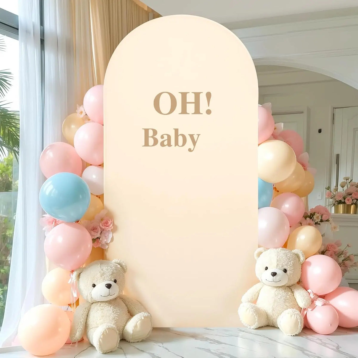 A light pink arched backdrop cover decorated with balloons and teddy bears for a baby shower or wedding