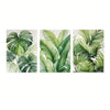 A set of three watercolor prints featuring lush green tropical leaves.