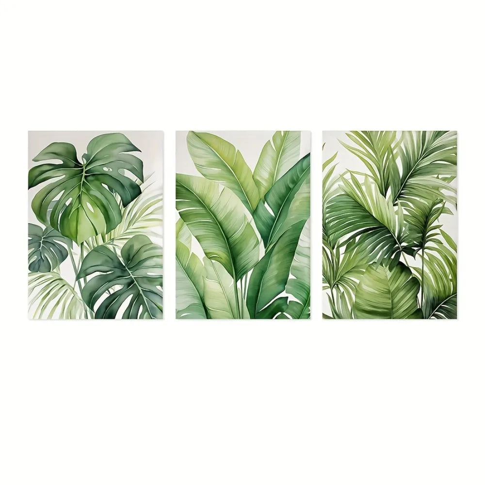 A set of three watercolor prints featuring lush green tropical leaves.