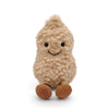 A fluffy, light brown plush toy resembling a peanut with small antlers and a scarf.