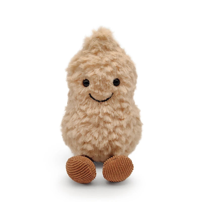 A fluffy, light brown plush toy resembling a peanut with small antlers and a scarf.