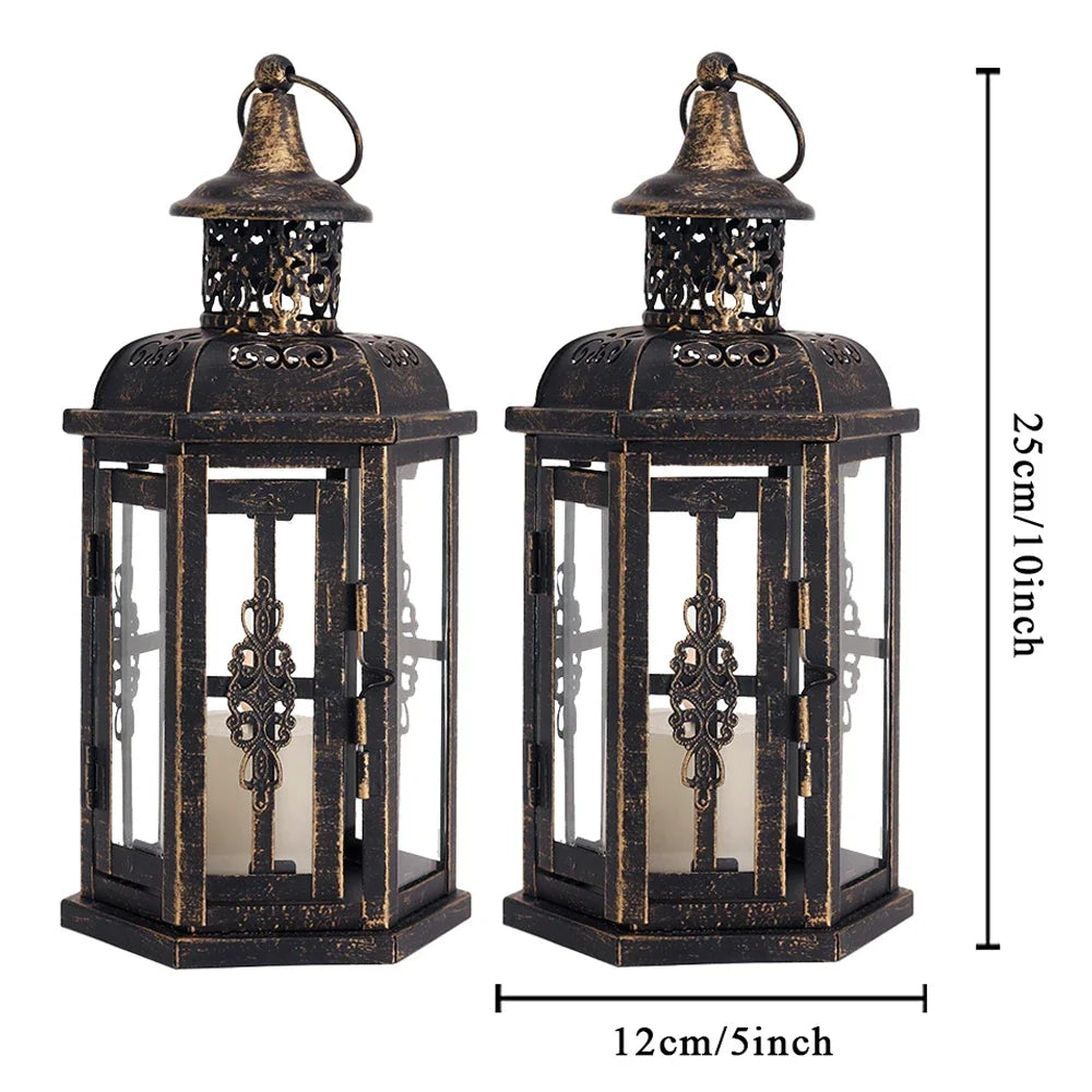 A vintage Nordic iron candle lantern with glass panes, featuring a dark finish and decorative metal top.