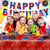 A red and blue spider web party supplies set featuring a banner with the words Happy Birthday