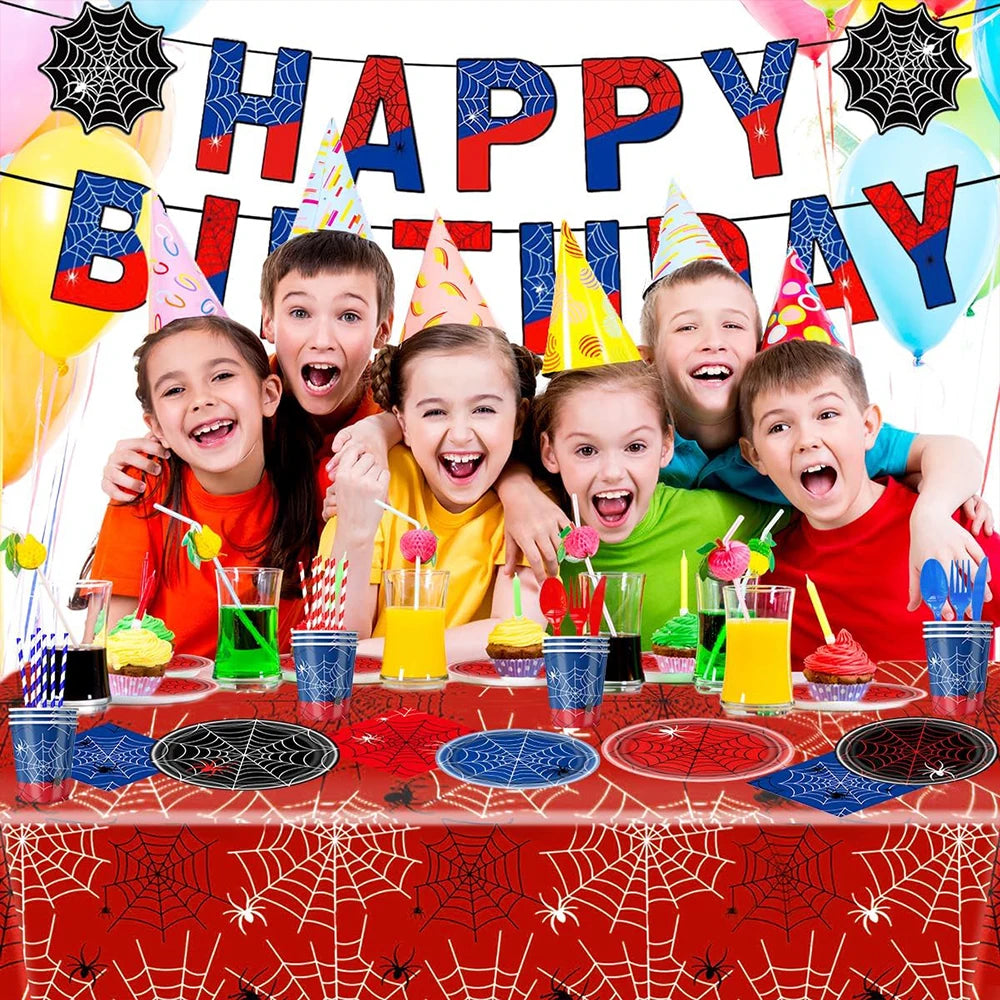 A red and blue spider web party supplies set featuring a banner with the words Happy Birthday
