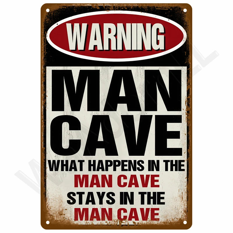 A vintage metal warning sign with red and white text that reads WARNING MAN CAVE.