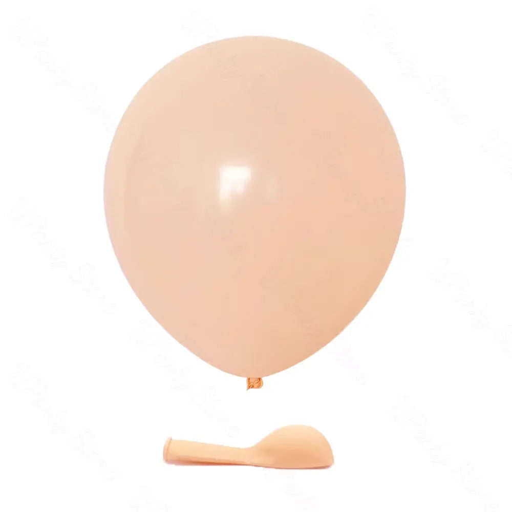 A single, round, pale peach latex balloon is shown against a white background.