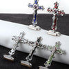 Three metal crucifix desk crosses with self-adhesive bases, featuring silver and blue enamel designs.
