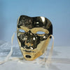 A shiny gold masquerade mask with an ancient style and hanfu-inspired design, displayed against a light background.