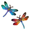 A vibrant, iridescent dragonfly sculpture featuring shades of blue, green, and orange.