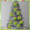 A Christmas tree decorated with twelve faux fur ornaments featuring green balls and bows.