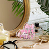 Pink bow acrylic heart sign with the text Pray on it pray through it for desk and home decor
