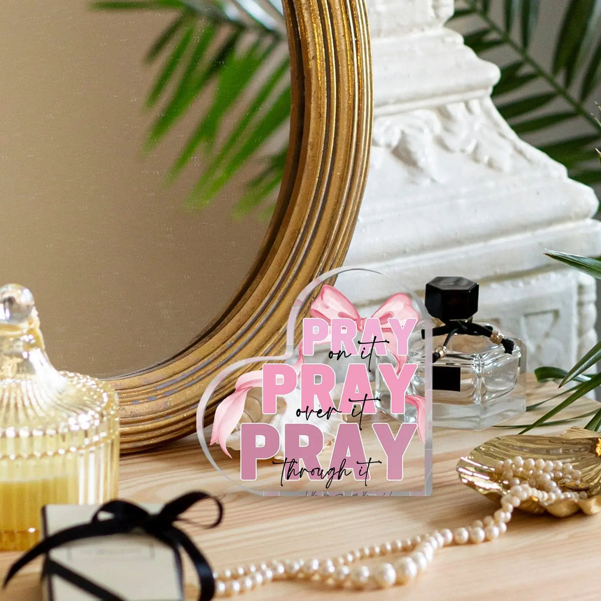 Pink bow acrylic heart sign with the text Pray on it pray through it for desk and home decor