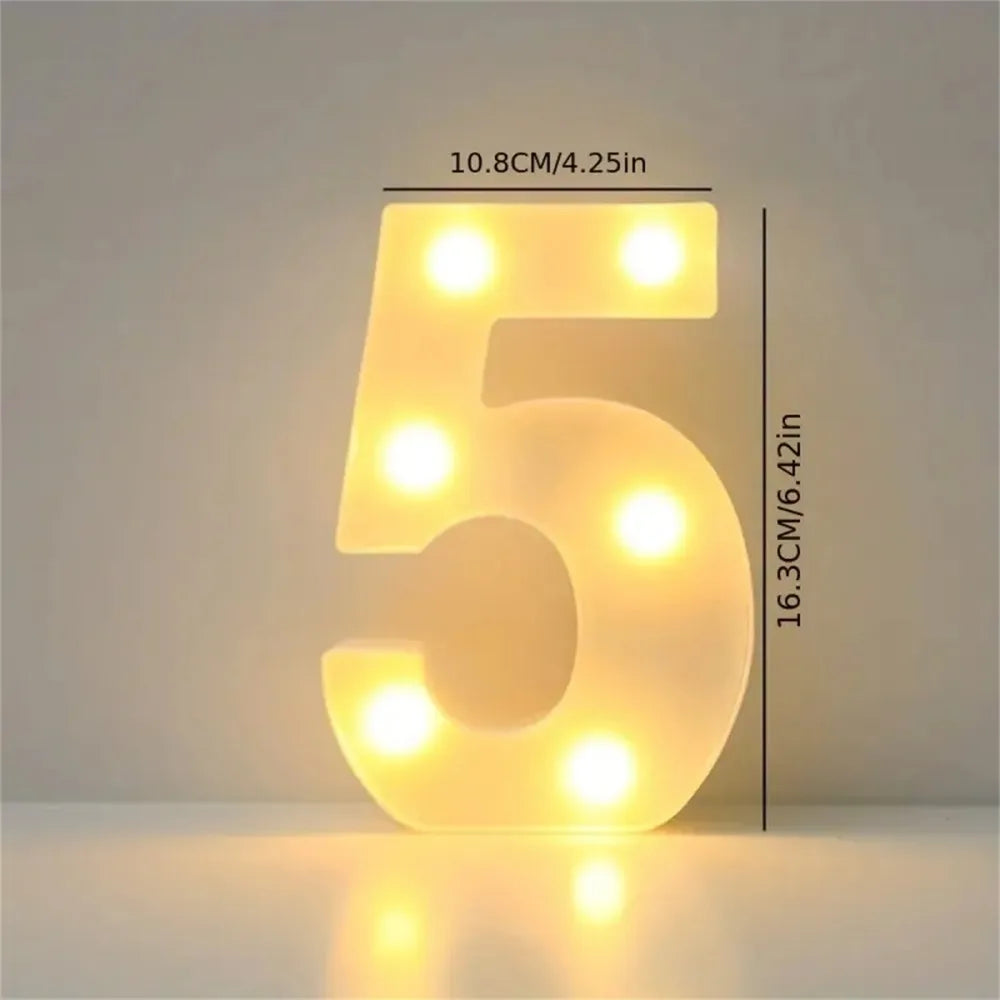 A glowing yellow LED letter light shaped like the number 5, used for room or party decor.