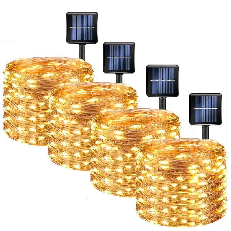 A set of solar powered fairy lights with multiple modes and black mounting posts for outdoor garden décor.