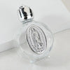 Decorative glass bottle with a silver figurine inside and a twist cap