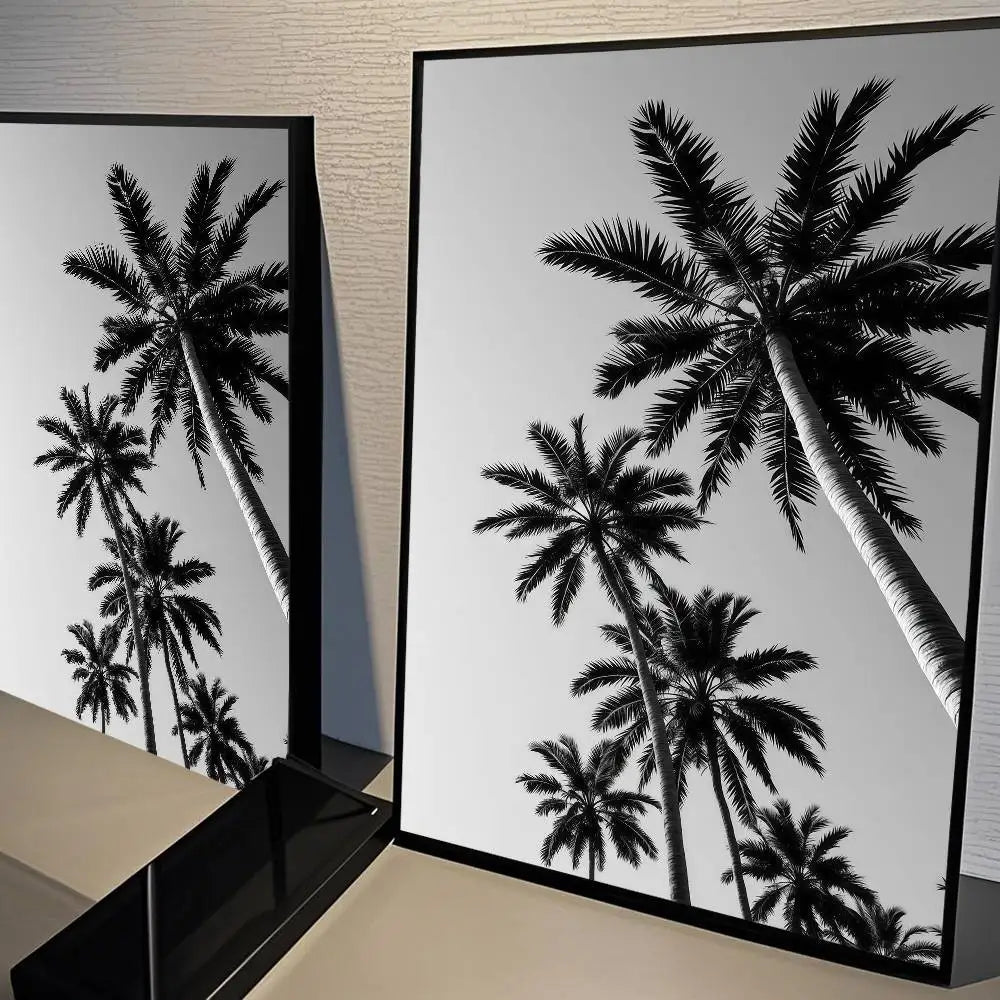 Black and white poster featuring silhouettes of palm trees against a light background.