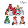 Ten reusable red and gold drawstring gift bags featuring a snowflake design for Christmas gifts