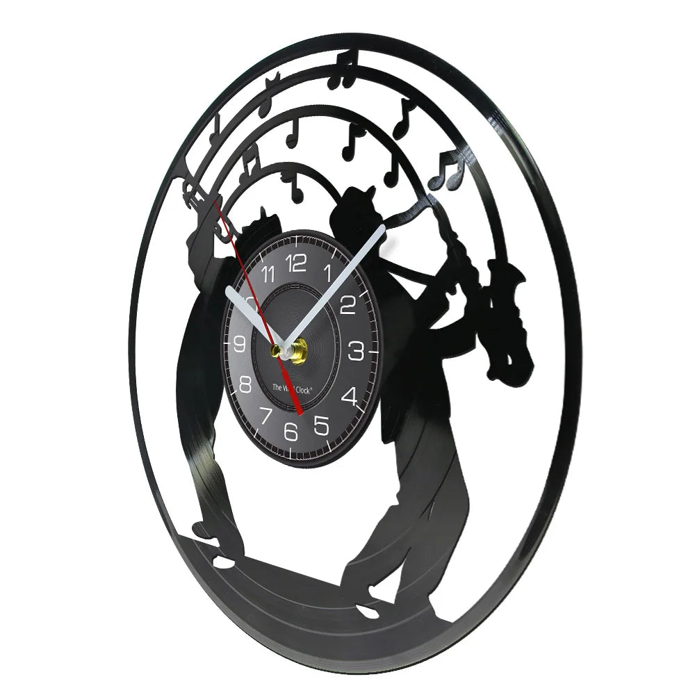 A black vintage vinyl record wall clock featuring a silhouette of a person and a clock face.