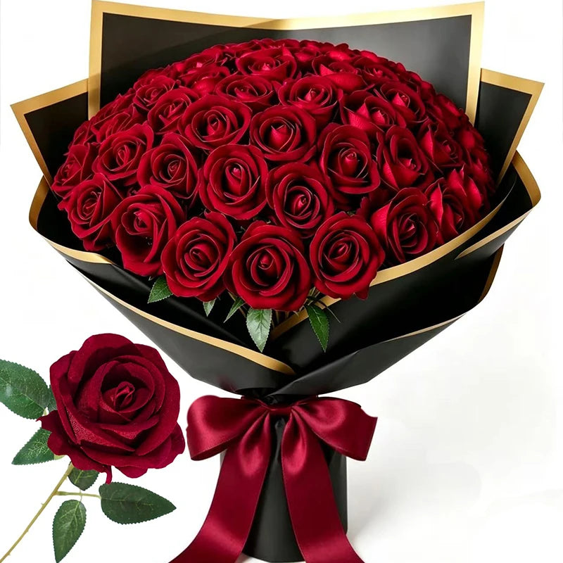 A bouquet of 50 deep red velvet touch artificial roses presented in a black and gold wrapping.