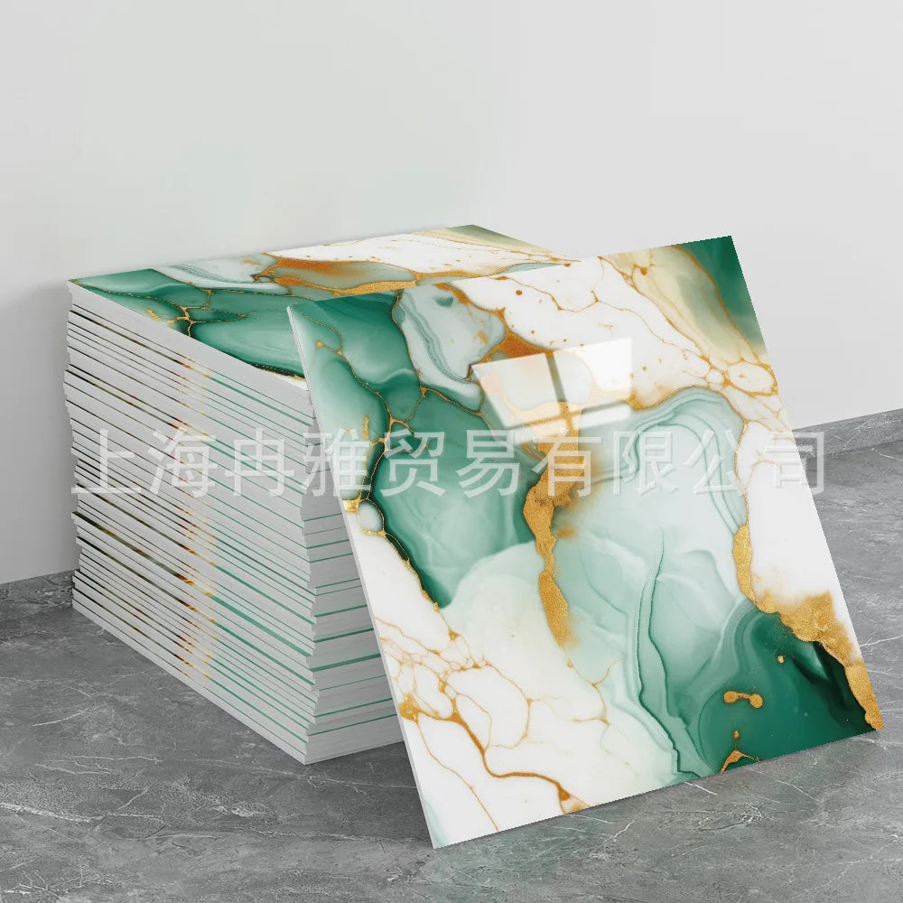 A roll of faux marble 3D self-adhesive wall tiles featuring green and white marble patterns with gold veining.