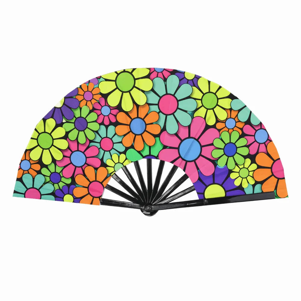 A folding rave hand fan with a vibrant, multicolored floral pattern featuring neon green, pink, orange, and purple hues.