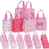 A collection of pink and white gift bags featuring various bow and heart cutouts.
