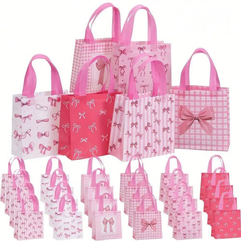 A collection of pink and white gift bags featuring various bow and heart cutouts.