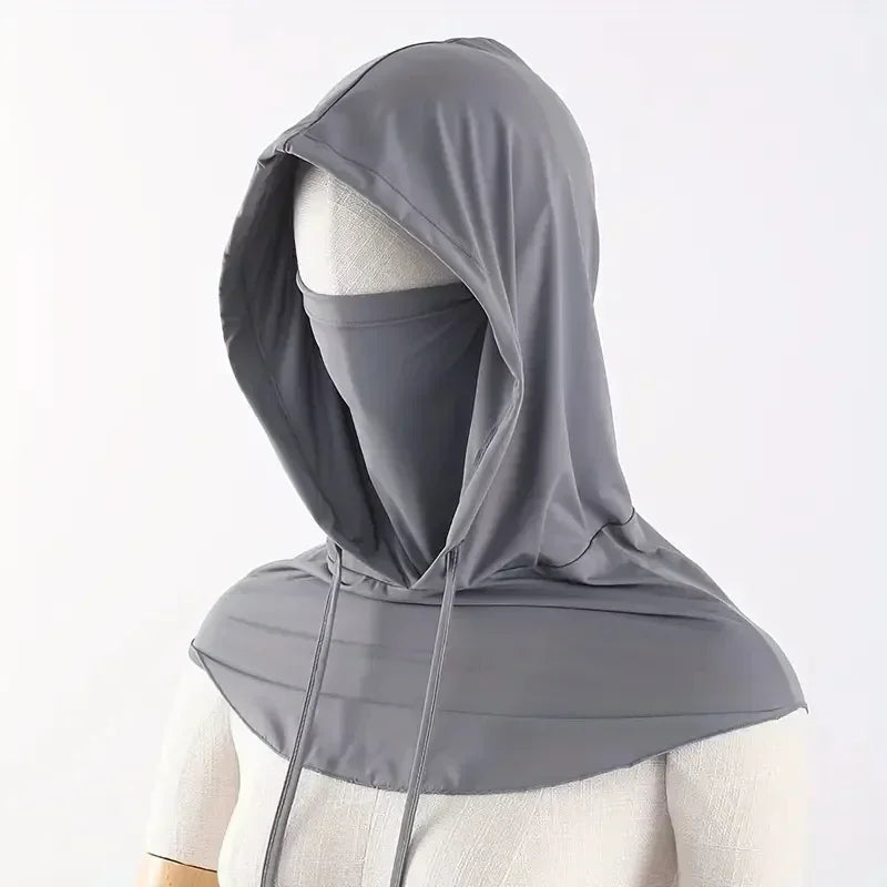 A gray breathable full head UV protection mask is shown on a mannequin.