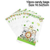 Ten packs of white candy bags featuring jungle safari animal designs for birthday parties