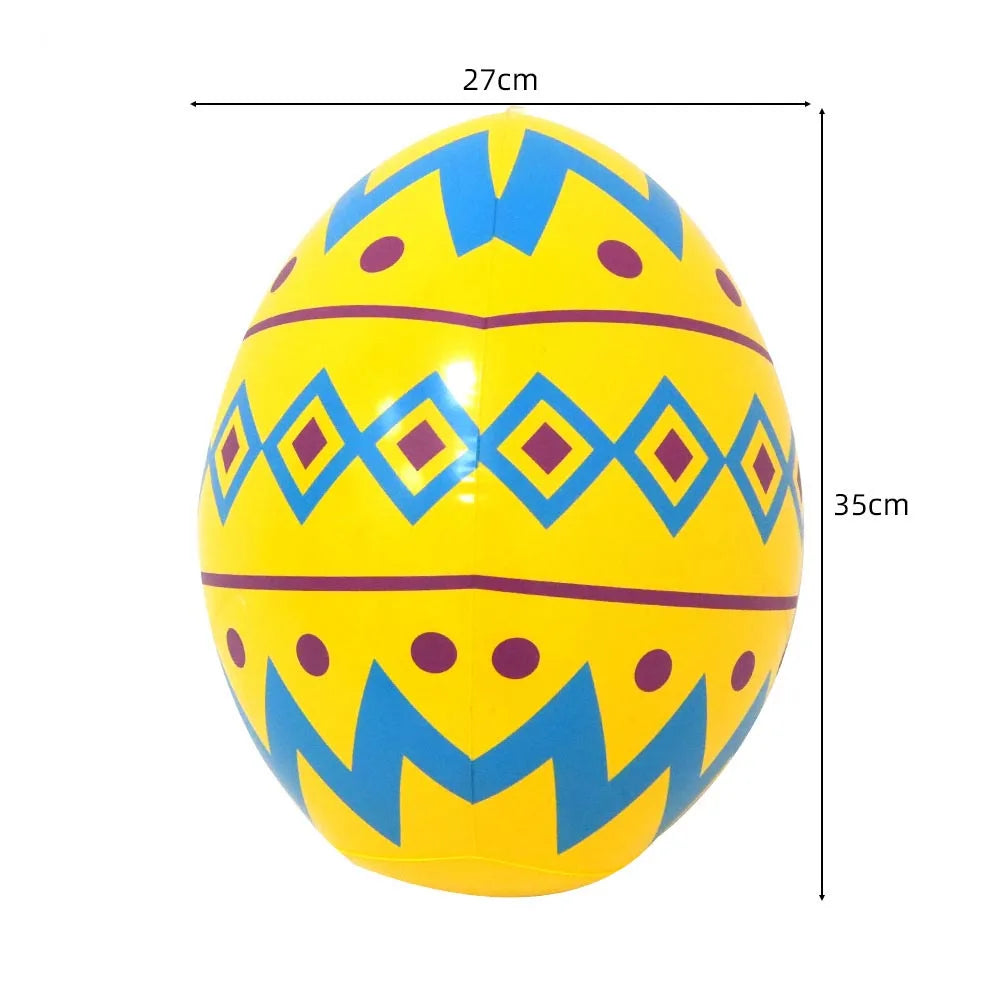 Yellow foil balloon shaped like an egg with blue and purple geometric patterns
