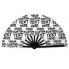 A black folding hand fan with a white background featuring various text patterns.