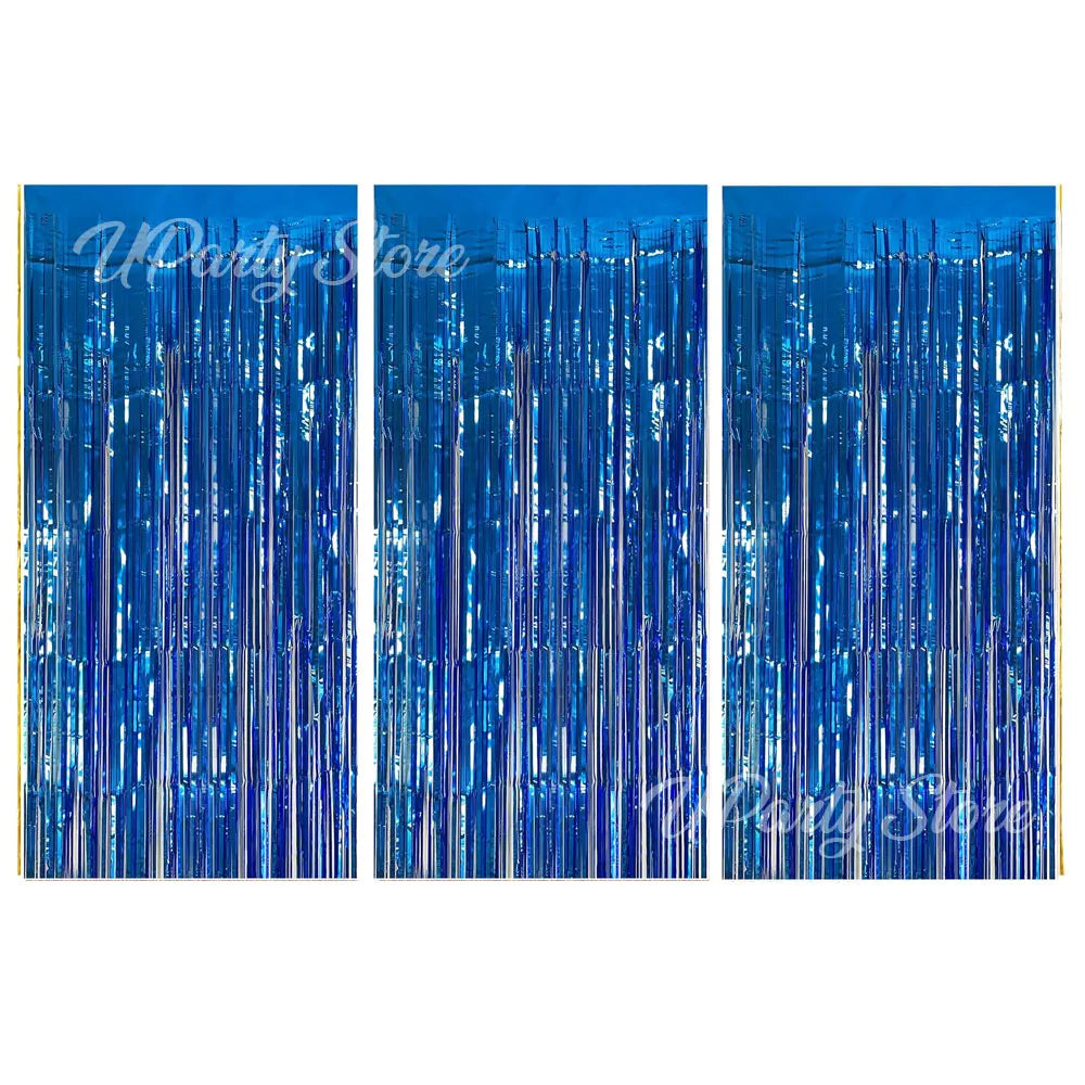 Three vertical strands of metallic blue fringe curtains for party backdrop decor