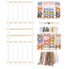 Wall-mounted headband holder displaying various colorful fabric headbands and hair accessories.