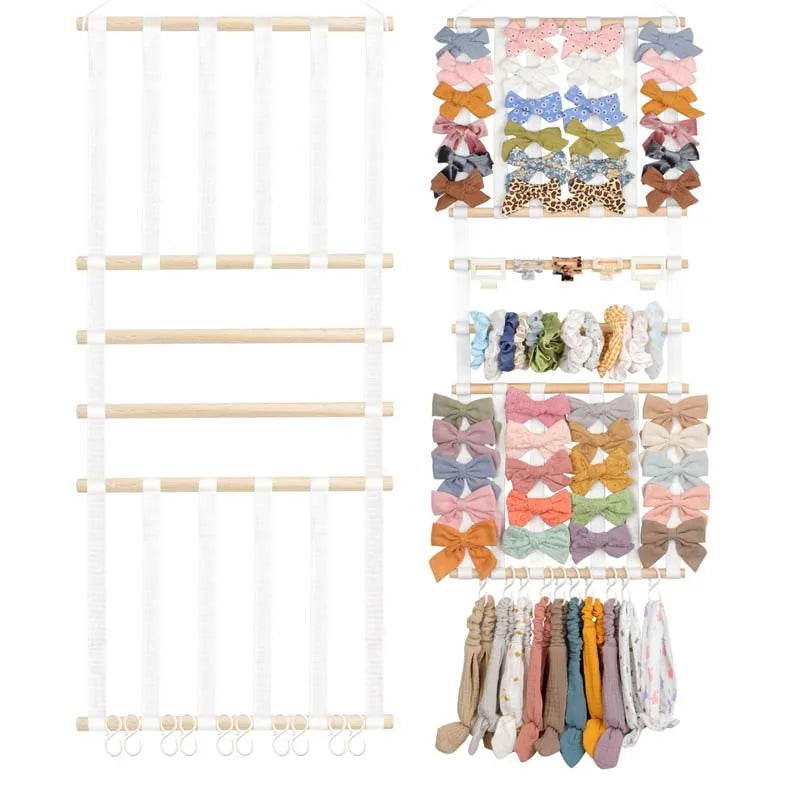 Wall-mounted headband holder displaying various colorful fabric headbands and hair accessories.