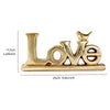 Retro gold and silver foil resin letters spelling the word LOVE
