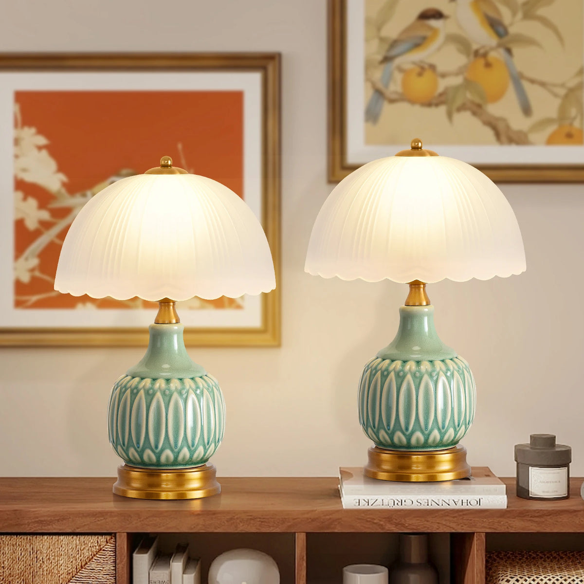 A pair of retro farmhouse ceramic table lamps with crackle glaze and brass bases on a wooden shelf.